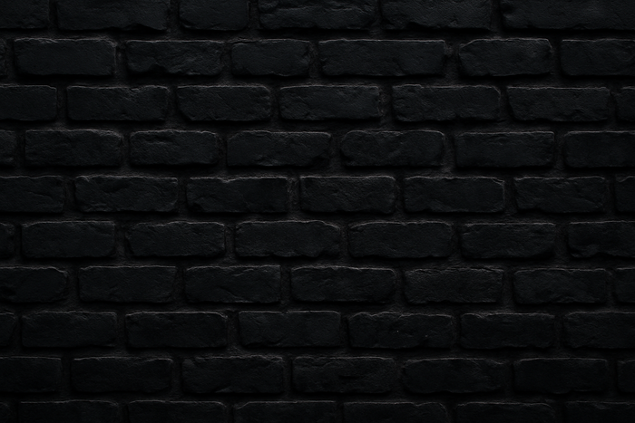 me puedes ayudar con una imagen con fondo oscuro de ladrillos